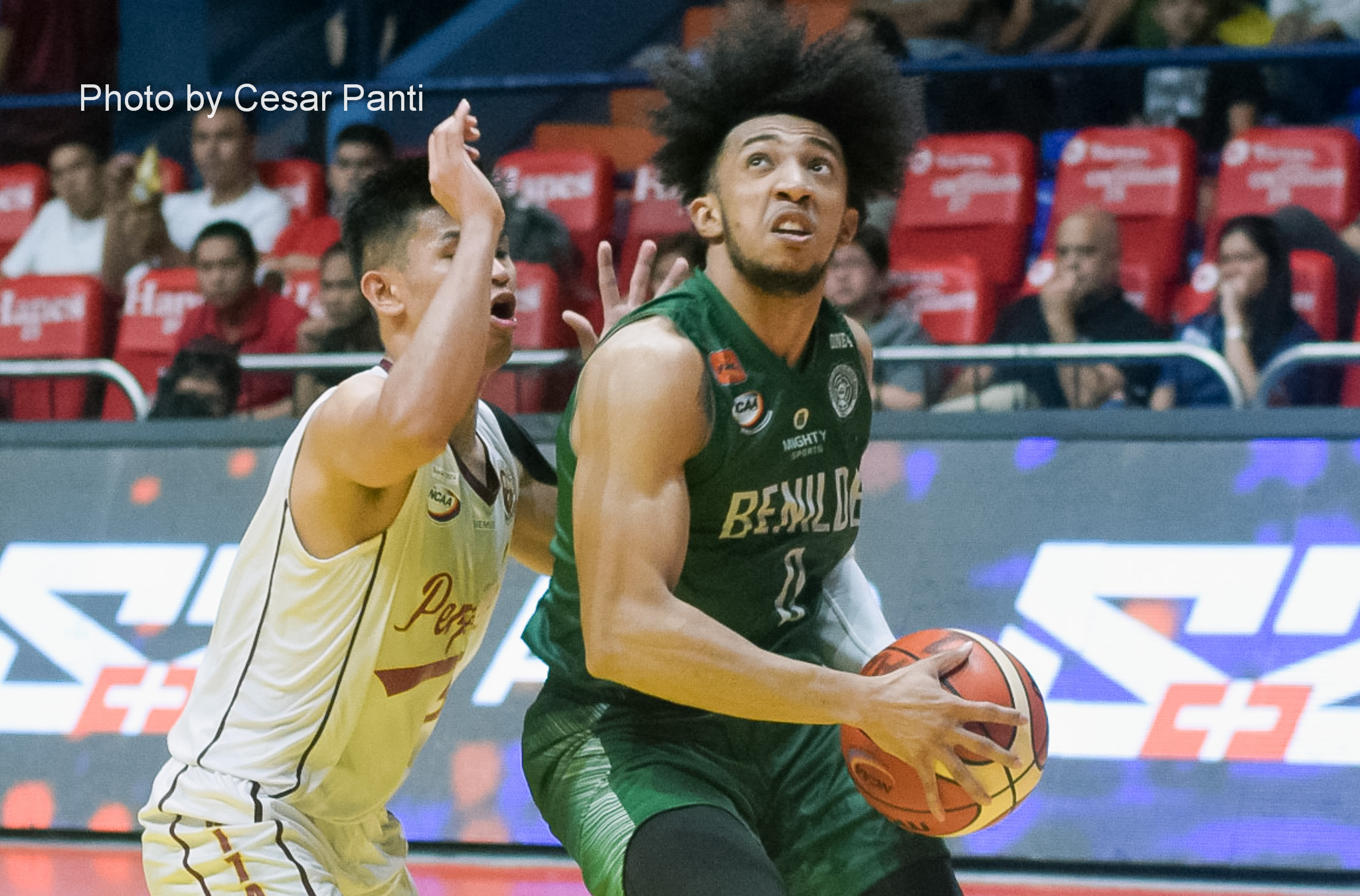 Hot-shooting St. Benilde downs Perpetual for third spot