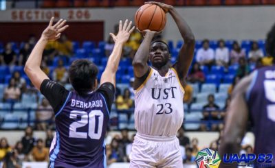 UST survives late Adamson rally, clinches playoff berth