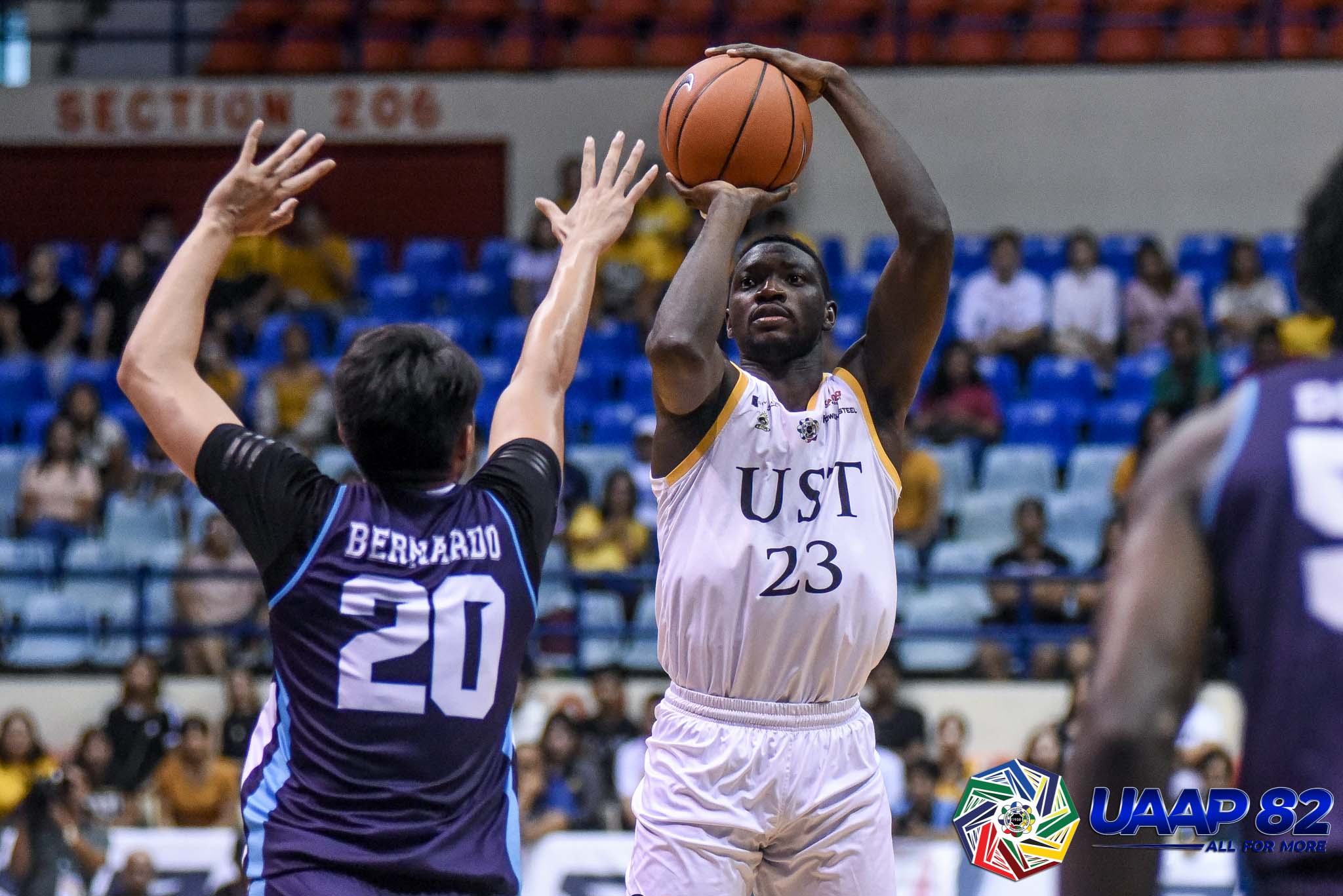 UST survives late Adamson rally, clinches playoff berth