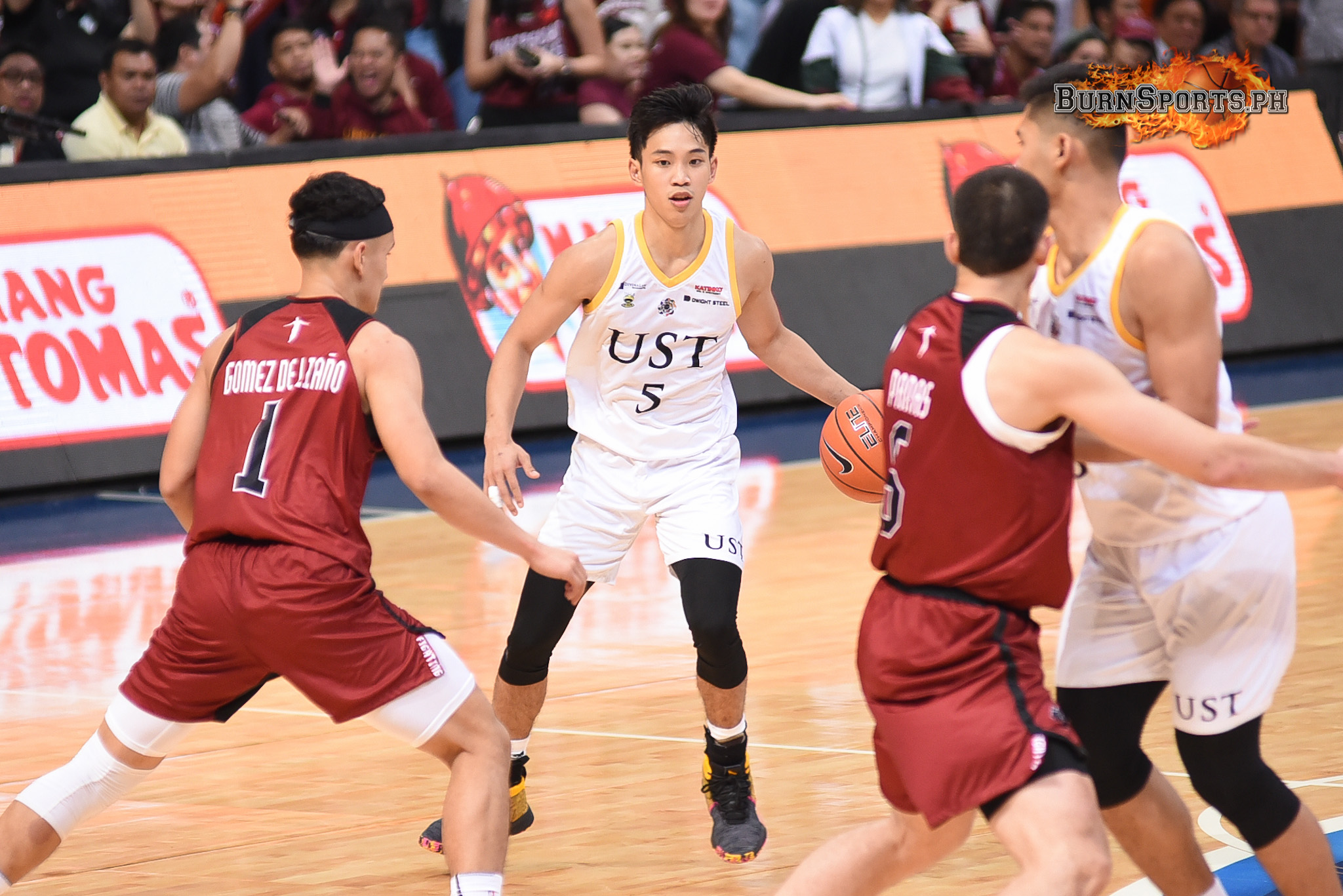 UST ousts UP in thriller, sets up finals clash with Ateneo
