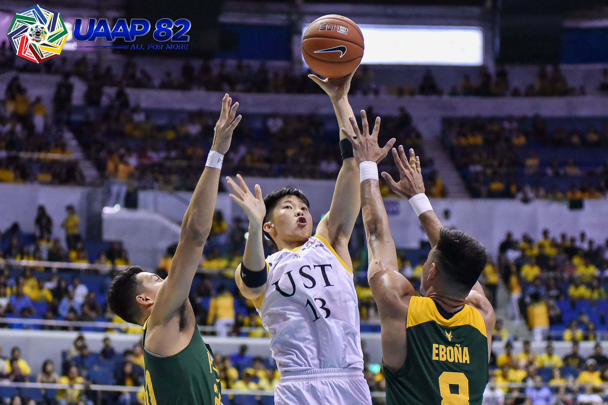 UST outlasts FEU, moves on to face second-seed UP
