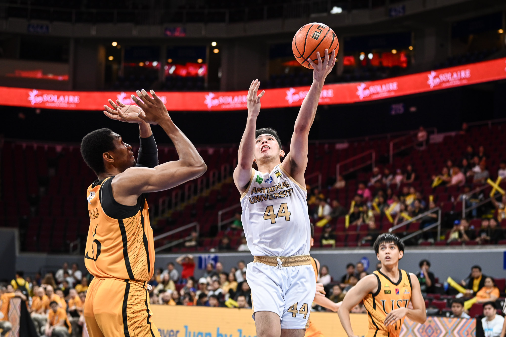 NU stuns UST to keep semis hopes alive